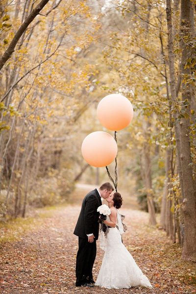 bride and groom with a balloon